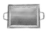 Top view of a silver plated tray with a wide pierced border, patterned base and side handles
