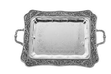 Rectangular silver plated tray with wide embossed scroll border, engraved center and two side handles