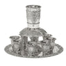 Silver plated grape design wine fountain with eight stemless cups arranged on a round tray, white background