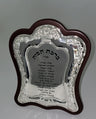 Silver plated Hebrew house blessing panel with floral border on a shaped dark wood backing