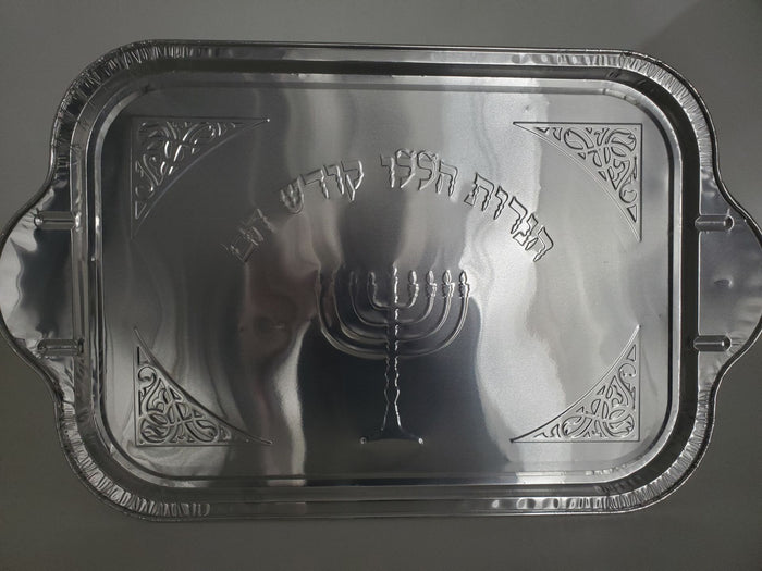 Rectangular silver foil tray embossed with Hebrew text, a menorah and scrolled corner designs