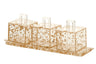 Long lucite tray with gold flakes carrying three small handled dishes in a row