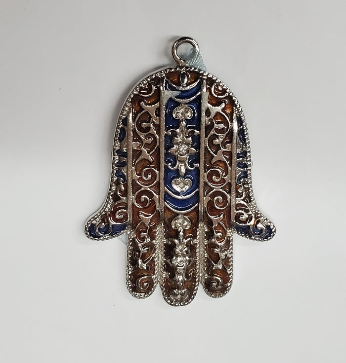 Silver-tone filigree hamsa over brown and blue enamel with hanging ring at the top