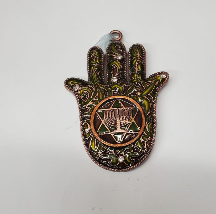 Copper-tone enamel hamsa with green swirls and a menorah inside a Star of David on the palm