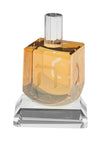 Gold crystal dreidel with etched Hebrew letters standing on a clear stem and base