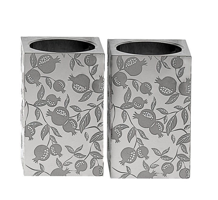 Pair of square tealight candlesticks covered in a grey pomegranate and leaf pattern