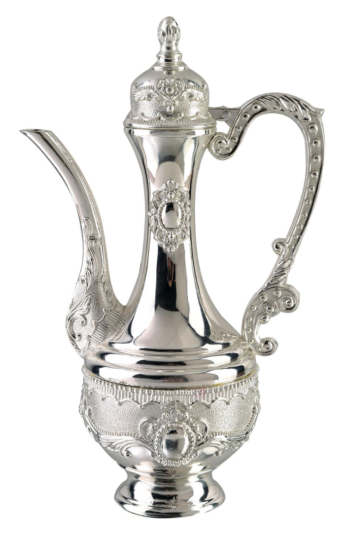 Silver-tone oil pitcher with long curved spout, scrolled handle, domed lid and embossed medallions