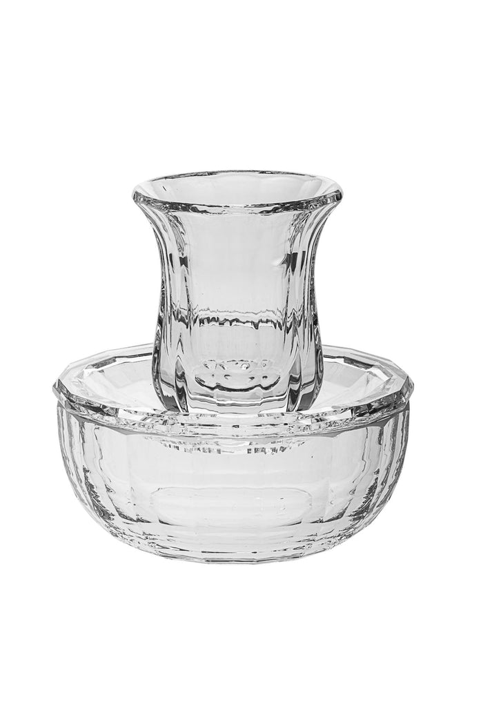 Clear crystal Mayim Achronim cup with paneled sides resting in a fluted crystal bowl