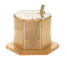 Lucite honey dish and its matching spoon resting on a polished gold tray