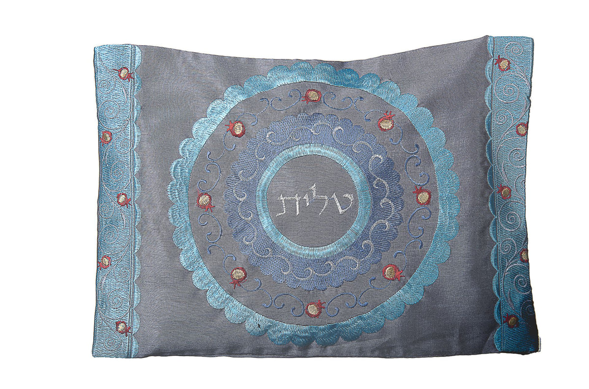 Grey tallit bag with turquoise embroidered medallion, red accents and Hebrew word Tallit