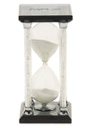 Hourglass timer with white sand, crystal-filled pillars and Hebrew 30 minutes on the dark top