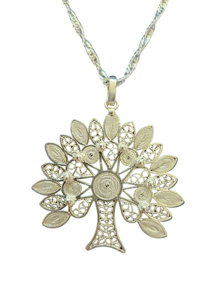 Sterling silver tree of life pendant in open filigree work on a fine chain