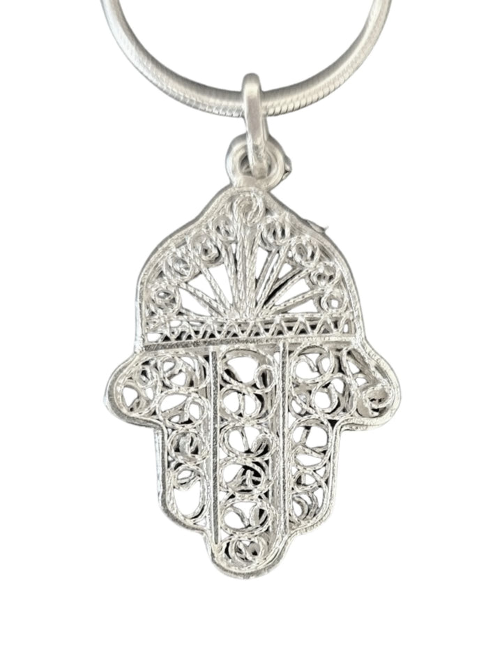 Sterling silver filigree hamsa with sunburst crown on a smooth snake chain