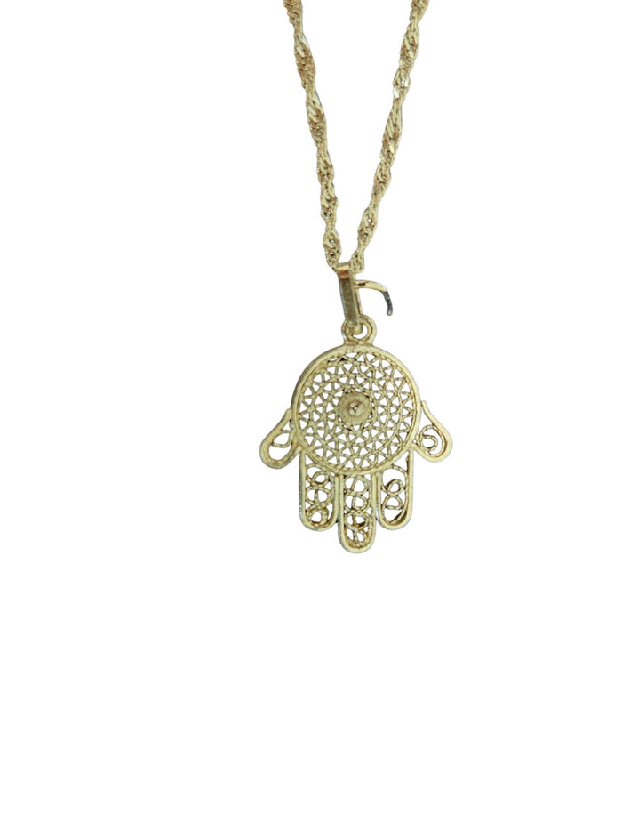 Rotunda filigree hamsa with a round lace palm on a twisted chain, photographed in warm light