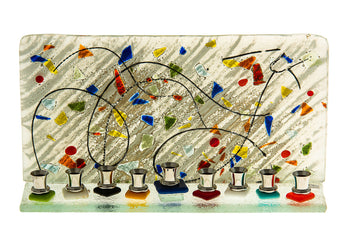 Multicolor glass Chanukah menorah built to hang flat against a wall