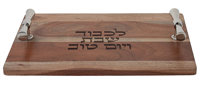 Rectangular wooden challah board with a carved handle at one end and visible grain