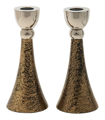 Two flared candlesticks with textured gold and black enamel finish and polished silver-tone cups