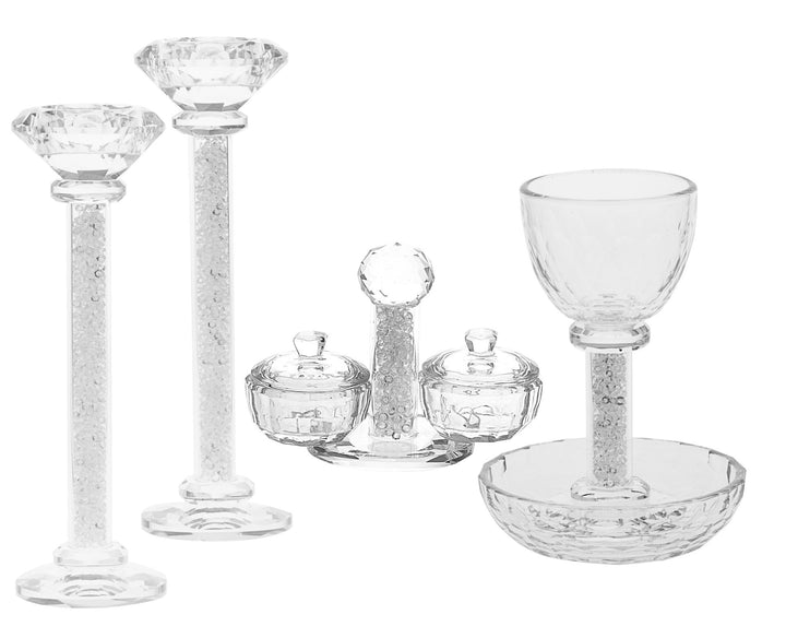 Clear crystal Shabbat set: pair of tall candlesticks, lidded salt and pepper set and Kiddush cup on a dish