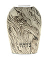 Grey metal tzedakah box with silver flares and Hebrew letters across the front