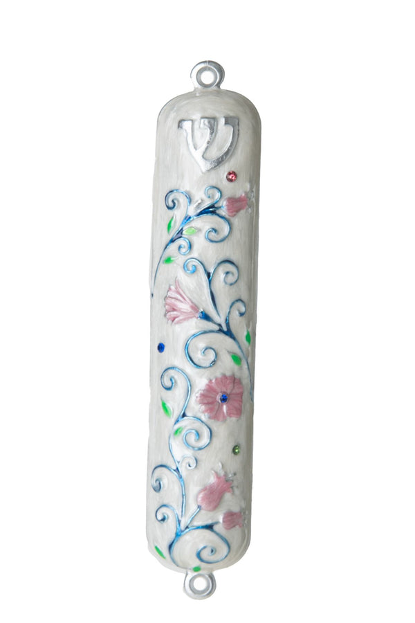 White enamel mezuzah case dotted with pink flowers and small jewels