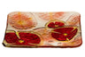 Square glass serving plate decorated with a pomegranate design across the surface