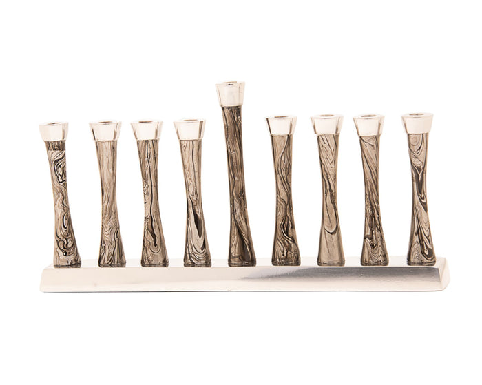 Gold metal menorah formed from a single swirling line with nine candle cups