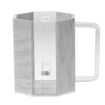 Faceted Lucite wash cup with grey marble panels, a clear front section and a squared clear handle