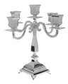 Five branch silver plated candelabra rising from a heavy square base