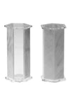 Pair of hexagonal marble-effect lucite salt and pepper shakers standing side by side