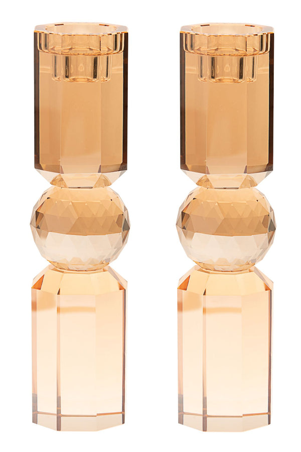 Medium gold toned crystal candlestick with a faceted stem and square foot