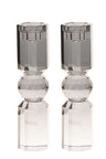 Single smoky grey crystal candlestick on a small square base with an open candle cup