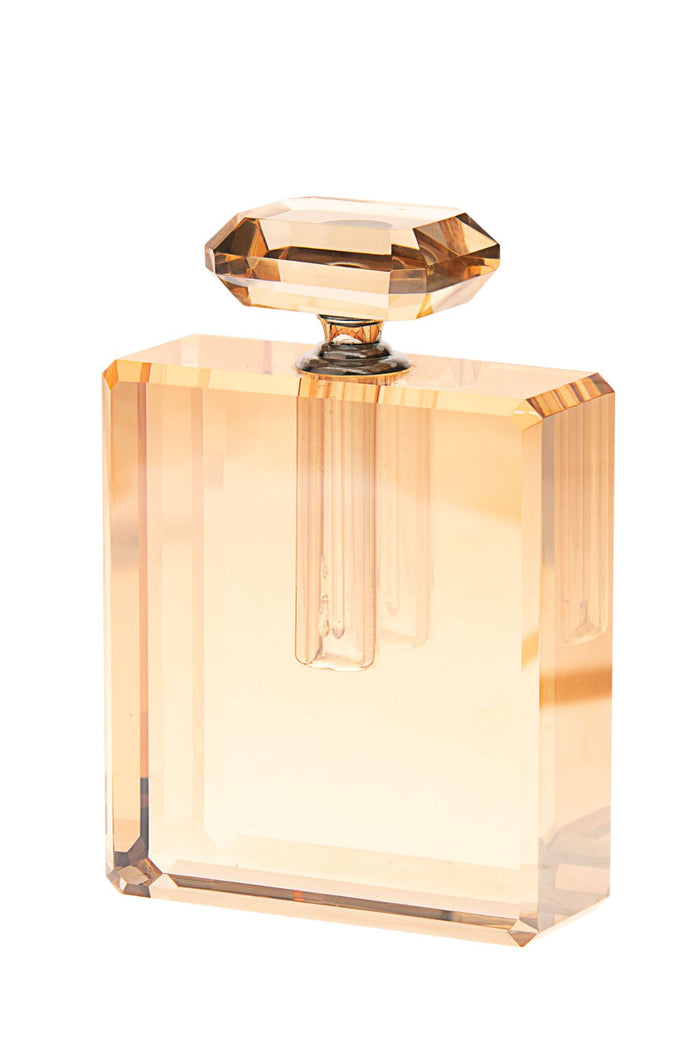 Gold-tinted crystal perfume bottle with beveled rectangular body and faceted stopper