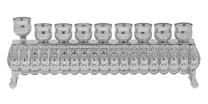 Wide low silver plated menorah with nine candle holders spread along a straight bar