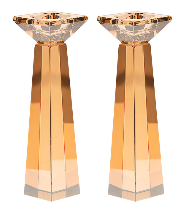 Medium gold toned crystal candlestick with a square base and a tapering stem