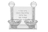 Low clear crystal tealight holder with a shallow well and faceted outer edges