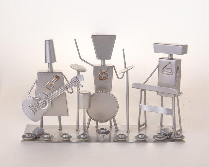 Silver toned metal menorah shaped as three musician figures with candle holders