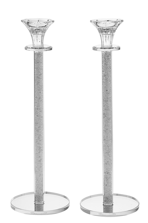 Tall crystal candlestick with clear crushed stones set inside its column and square base
