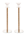 Tall crystal candlestick whose hollow stem is packed with crushed gold stones