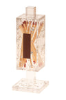 Clear lucite matchbox cover with gold flakes suspended through its walls