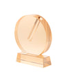 Narrow gold toned crystal vase with a tapered body above a small footed base