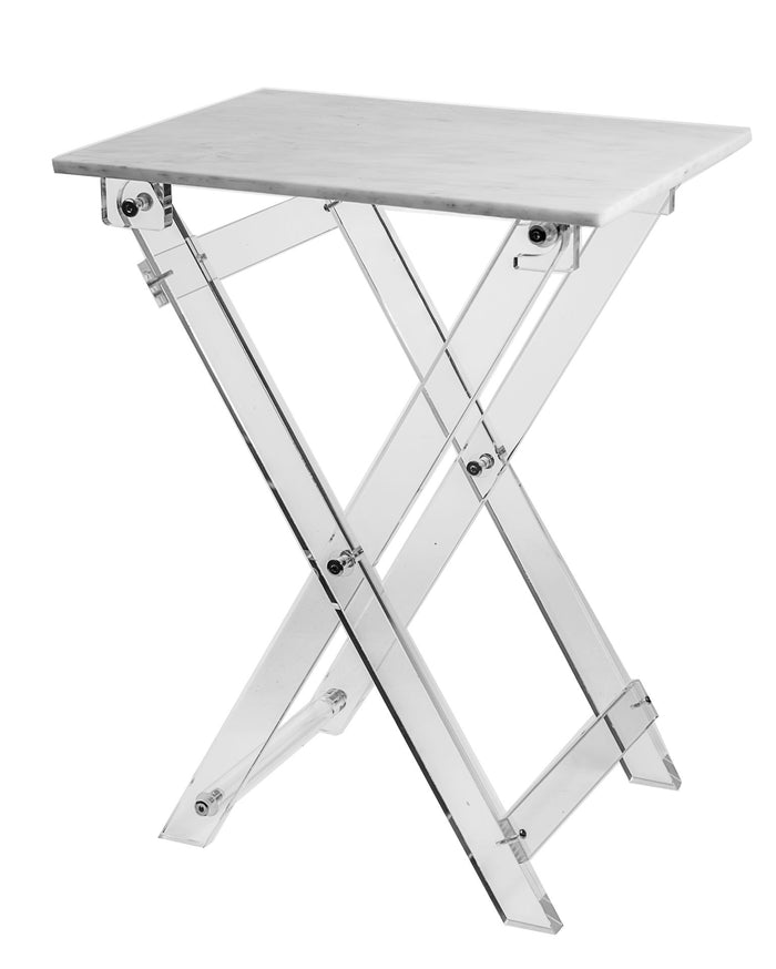 Side table with a white marble-look top on crossed clear Lucite legs