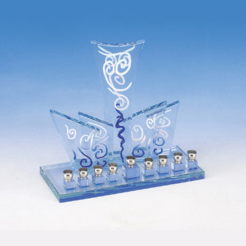Art deco glass Chanukah menorah with three fanned panels of blue and white swirls above nine small candle cups