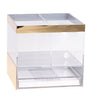 Gold and clear lucite stand holding six benchers above an open napkin shelf