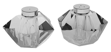 Two small clear crystal salt and pepper shakers with silver tone detail