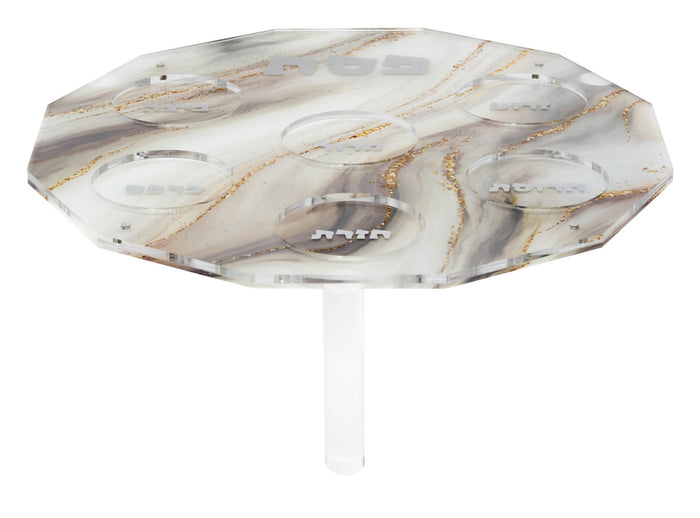 Round marbled lucite seder plate with gold veining, lifted on four short legs