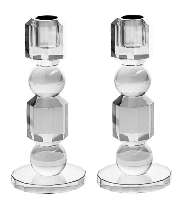 Clear crystal candlestick with a cut faceted stem on a broad square base