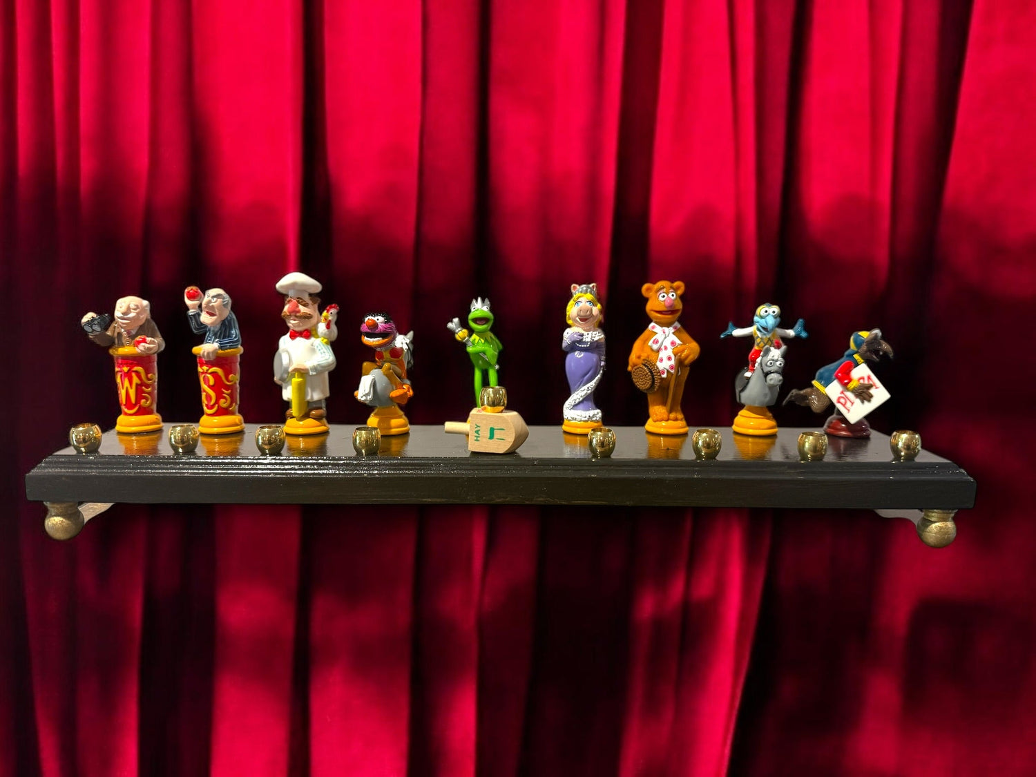 Muppets cast menorah — nine repurposed Muppets figures along a long plaque with brass cups | Judaica Square Lakewoo (view 21)
