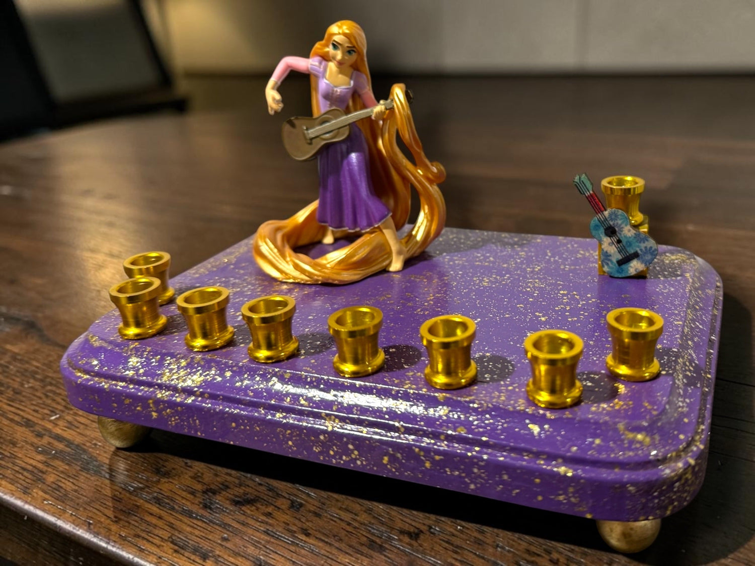 Rapunzel menorah — Tangled figure with wooden guitar shamash on painted base | Judaica Square Lakewood (view 9)