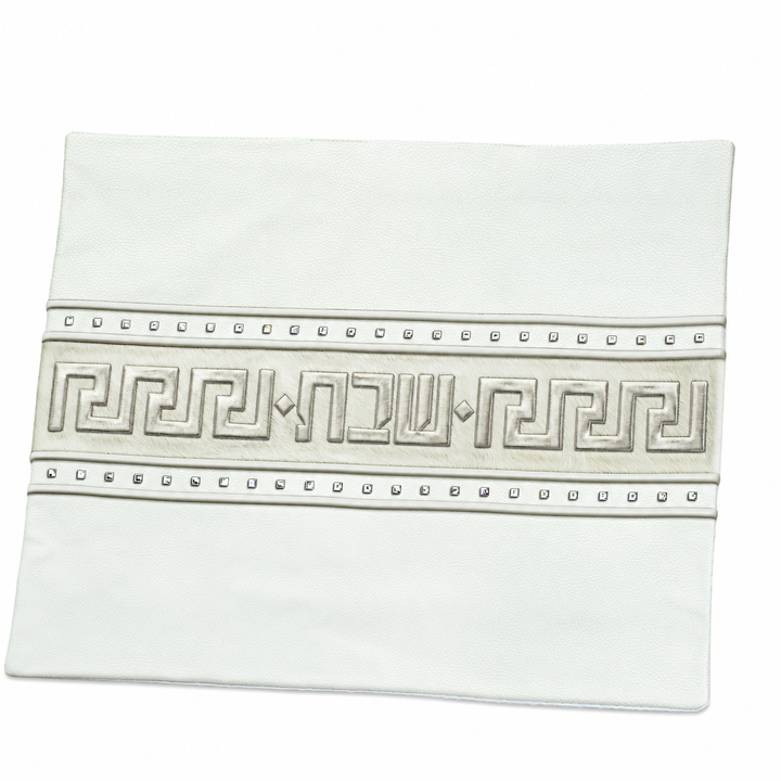 White leather challah cover with a central textured band, geometric embroidery and Hebrew Shabbos lettering