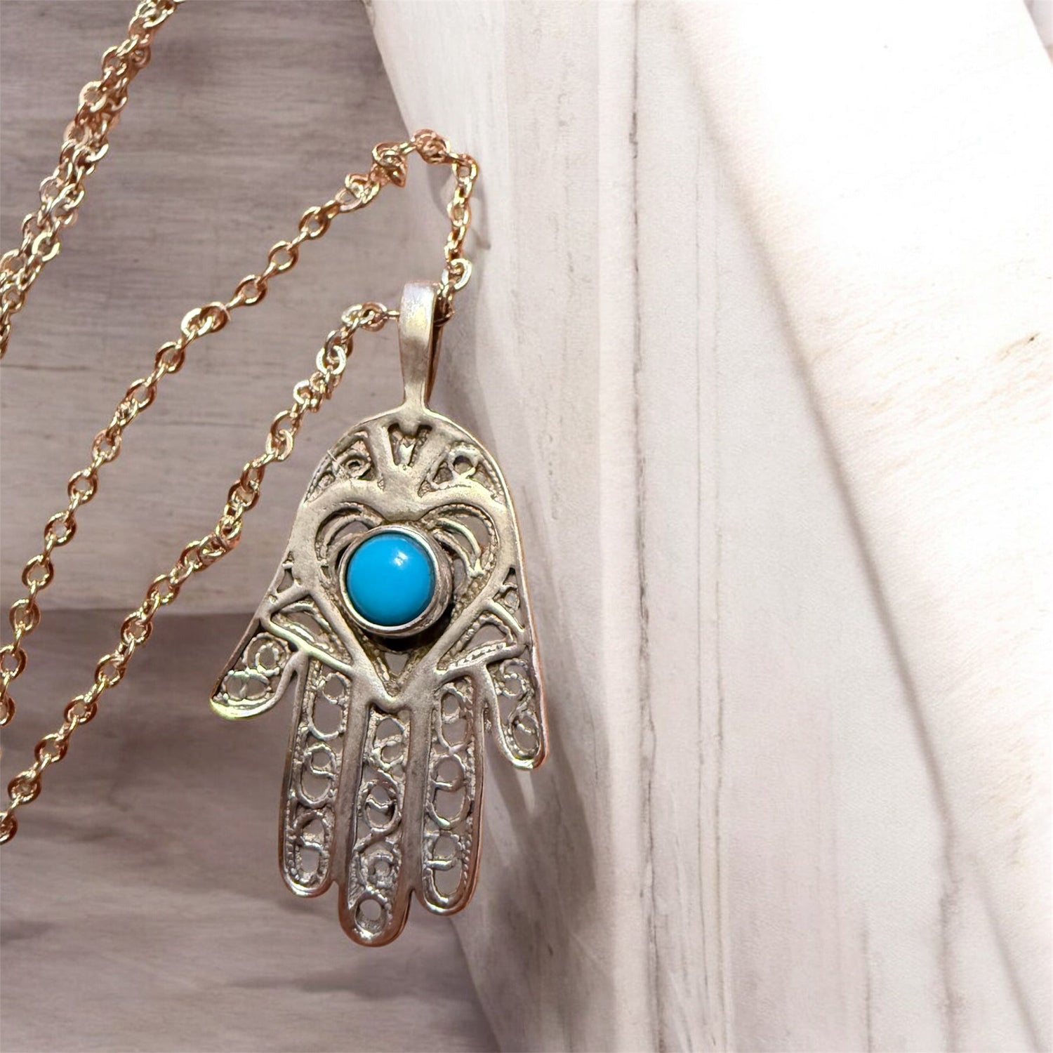 Turquoise stone hamsa hand pendant on a long sterling silver chain | Judaica Square Lakewood (view 7)